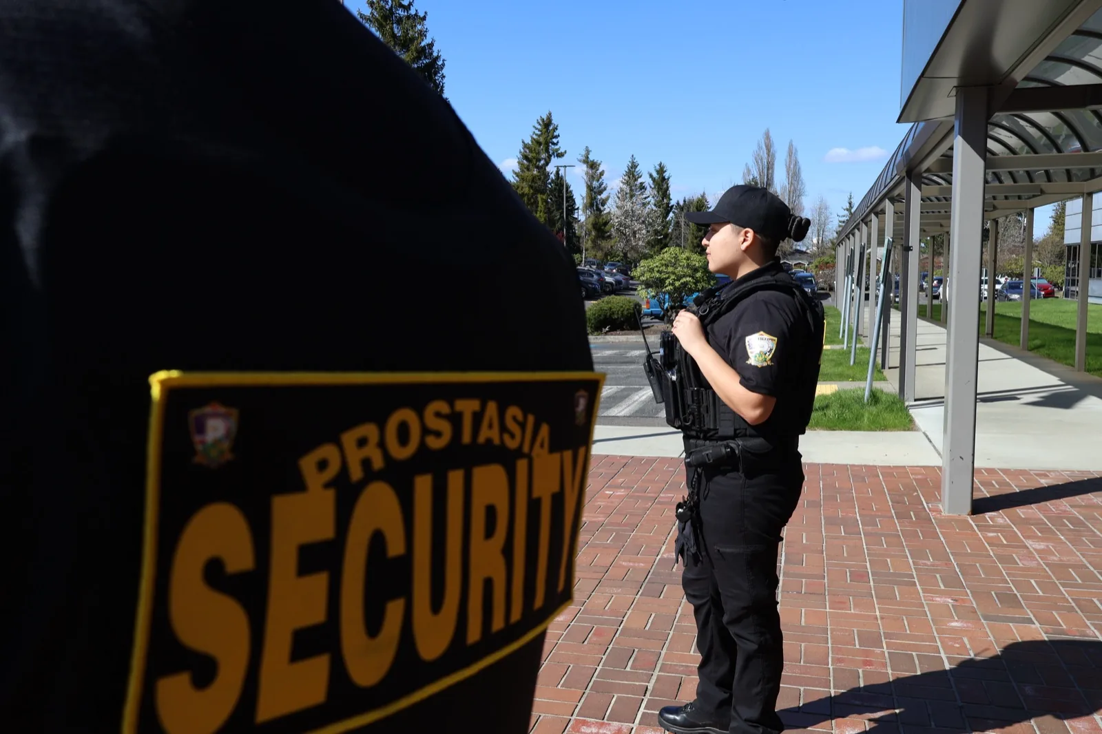 PROSTASIA security officers outside a commercial building